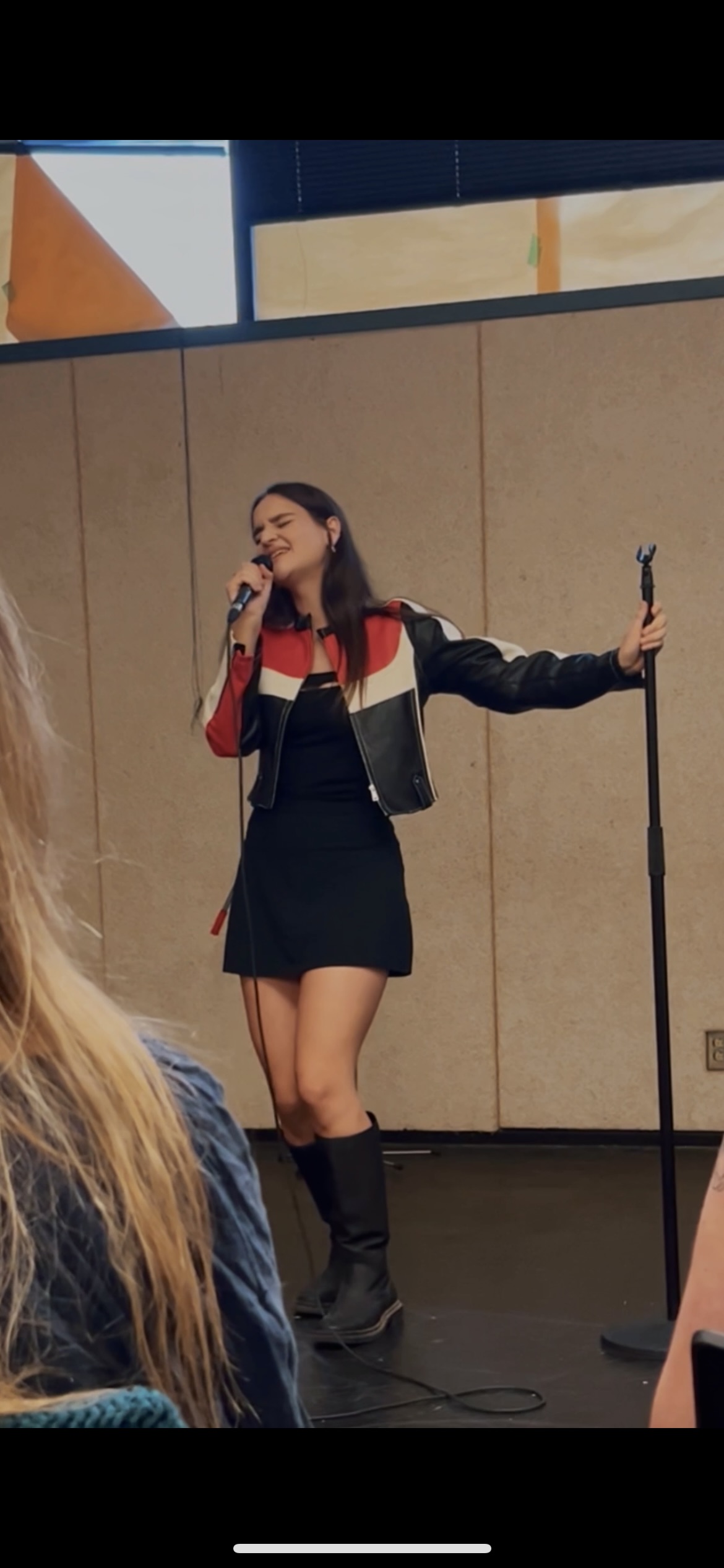 Victoria Brimble performing in costume on stage