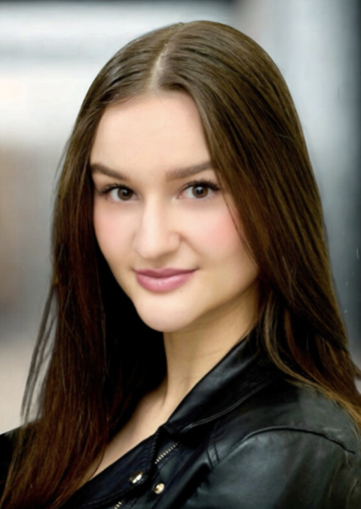 Victoria Brimble in a professional studio headshot